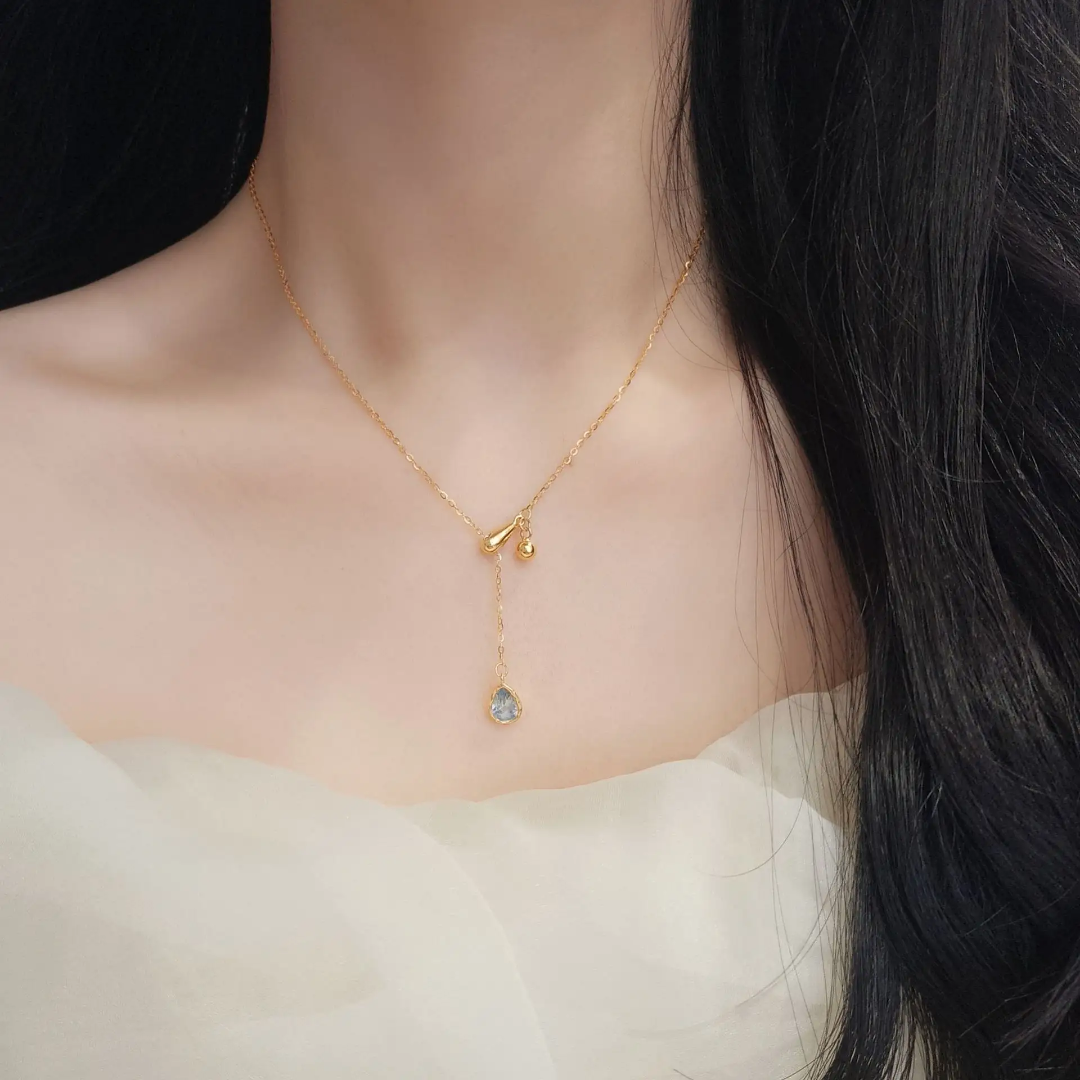 925 STERLING SILVER NECKLACE WITH BLUE DROPLET PENDANT OF CUBIC ZIRCONIA