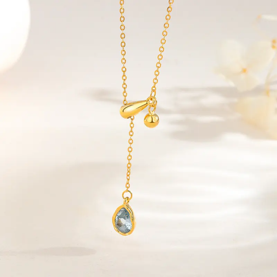 925 STERLING SILVER 18K GOLD-PLATED NECKLACE WITH BLUE DROPLET PENDANT OF CUBIC ZIRCONIA