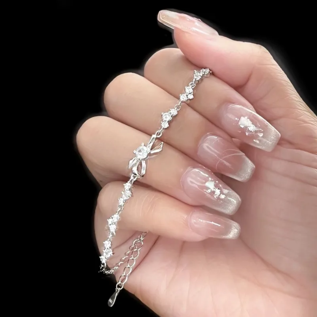 925 STERLING SILVER BOW BRACELET CRUSTED WITH CUBIC ZIRCONIA STONES