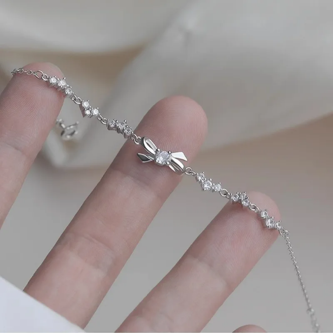 925 STERLING SILVER BOW BRACELET CRUSTED WITH CUBIC ZIRCONIA STONES