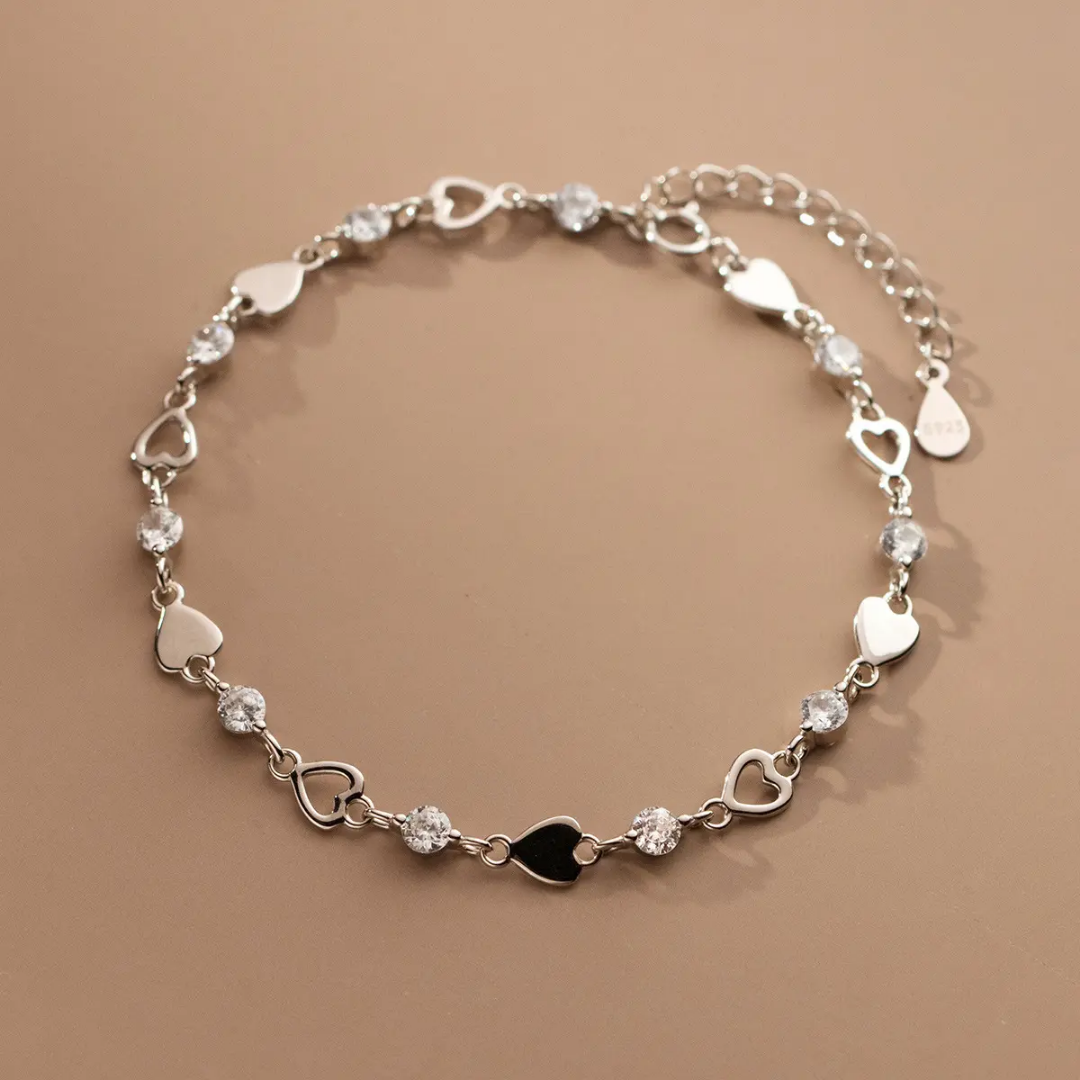 925 STERLING SILVER HEART BRACELET LINED WITH CUBIC ZIRCONIA STONES