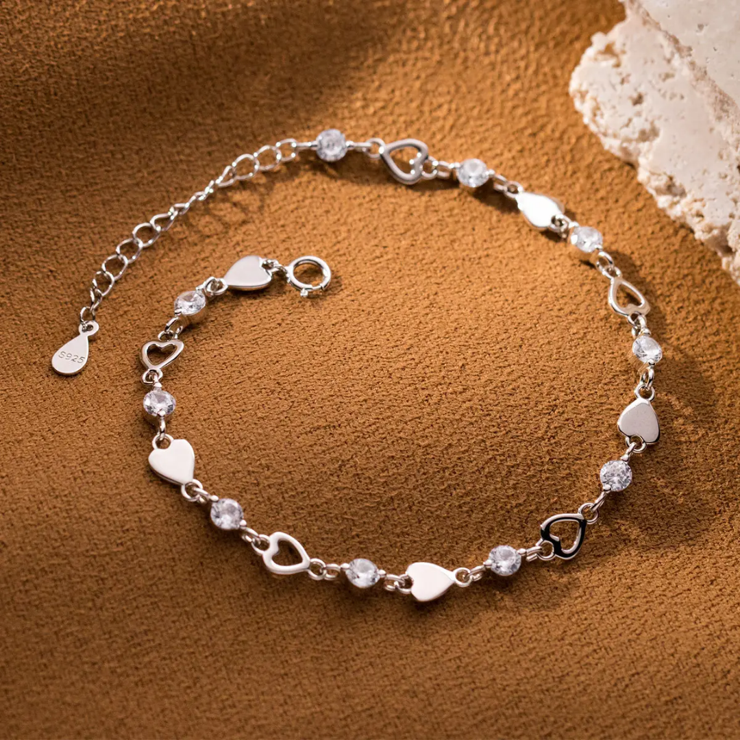 925 STERLING SILVER HEART BRACELET LINED WITH CUBIC ZIRCONIA STONES