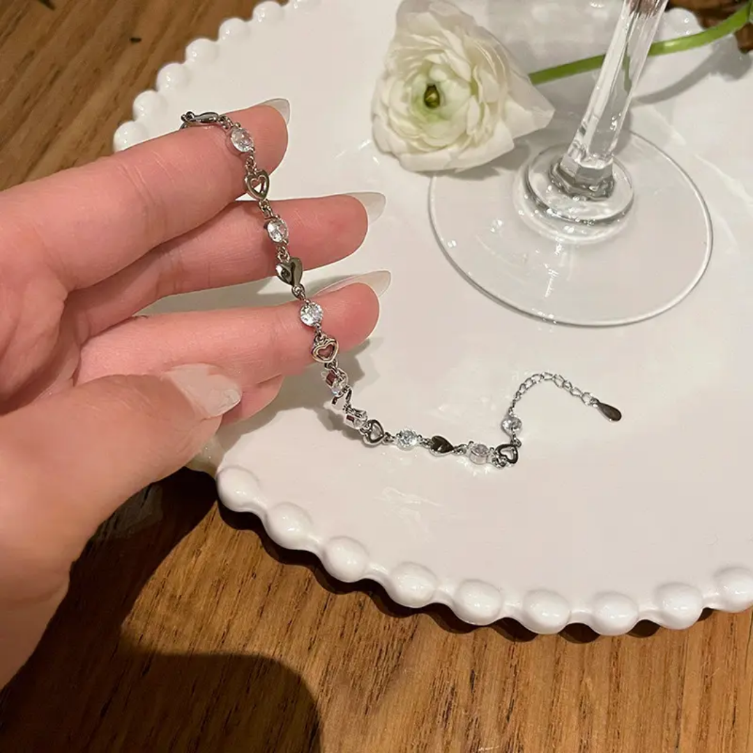 925 STERLING SILVER HEART BRACELET LINED WITH CUBIC ZIRCONIA STONES