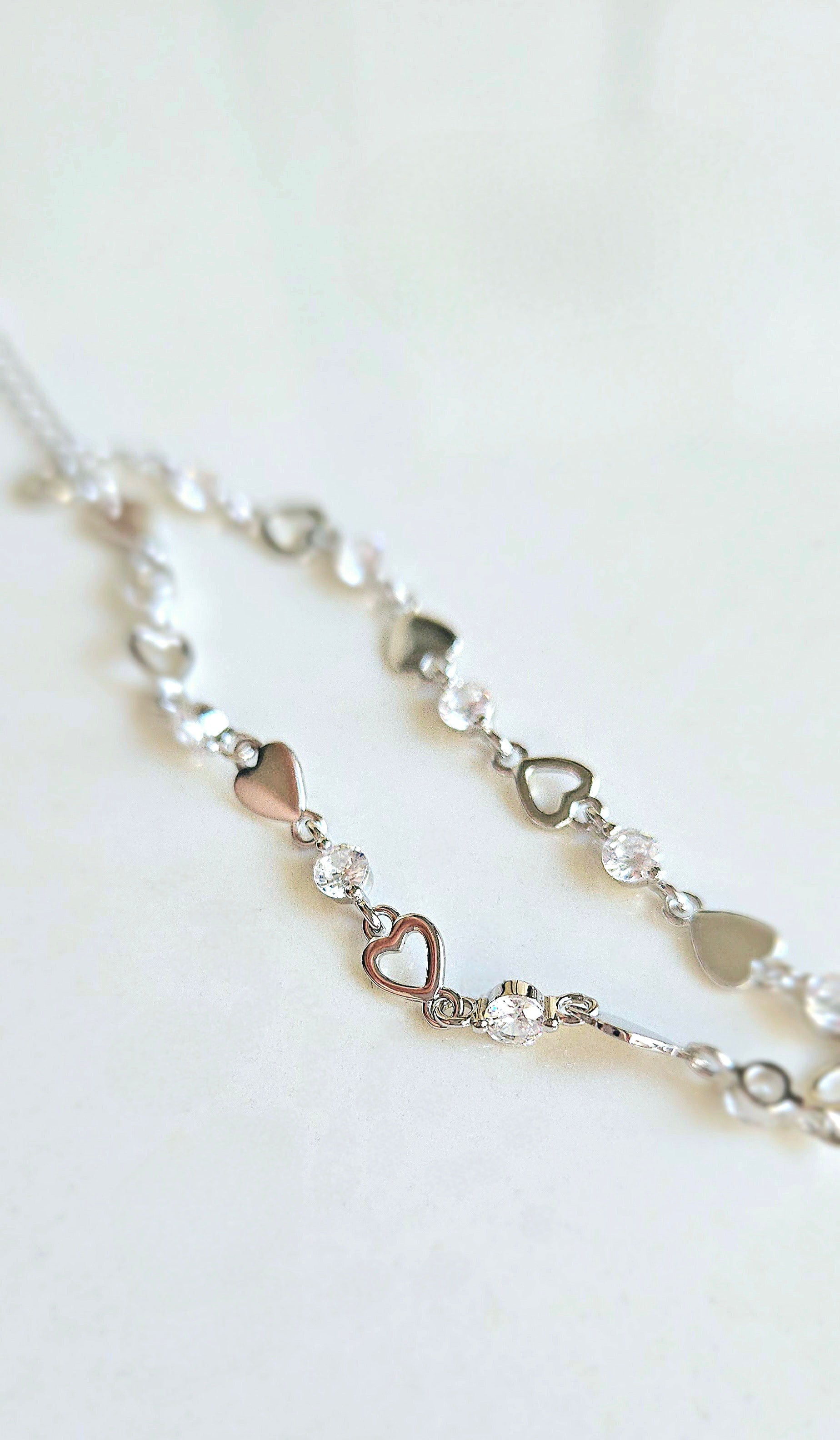 925 STERLING SILVER HEART BRACELET LINED WITH CUBIC ZIRCONIA STONES