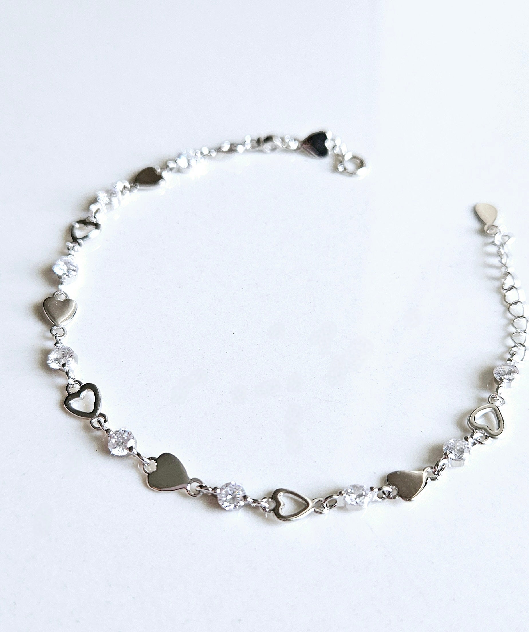 925 STERLING SILVER HEART BRACELET LINED WITH CUBIC ZIRCONIA STONES