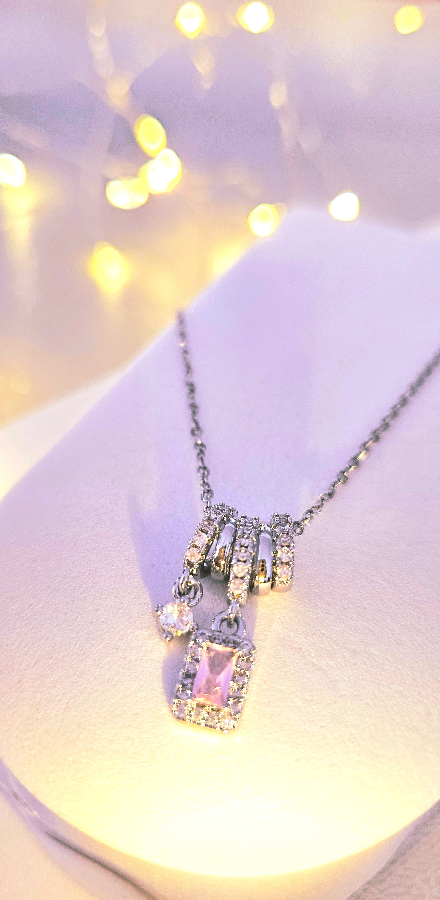 STAINLESS STEEL NECKLACE WITH PINK CUBIC ZIRCONIA PENDANT