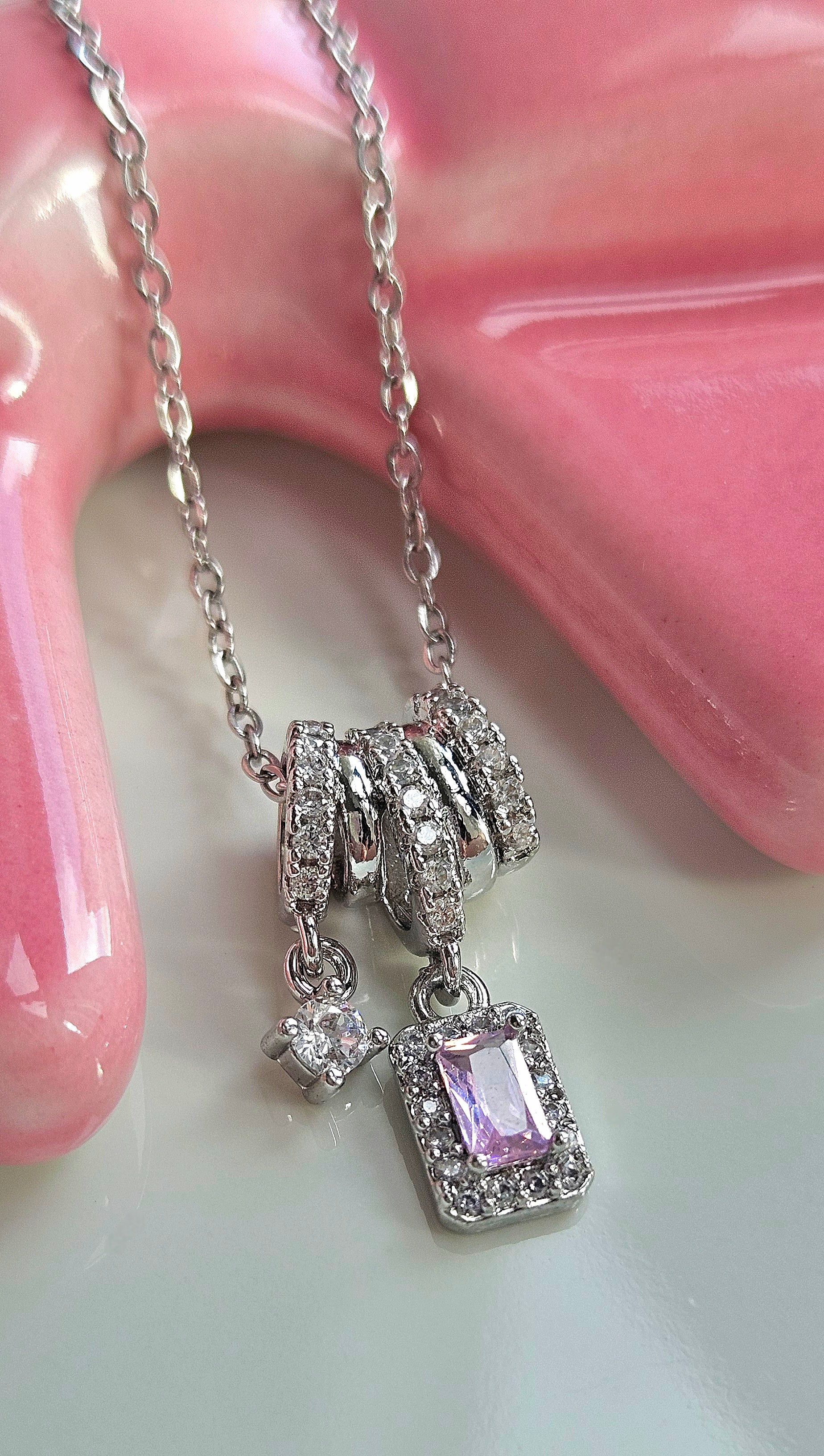 STAINLESS STEEL NECKLACE WITH PINK CUBIC ZIRCONIA PENDANT