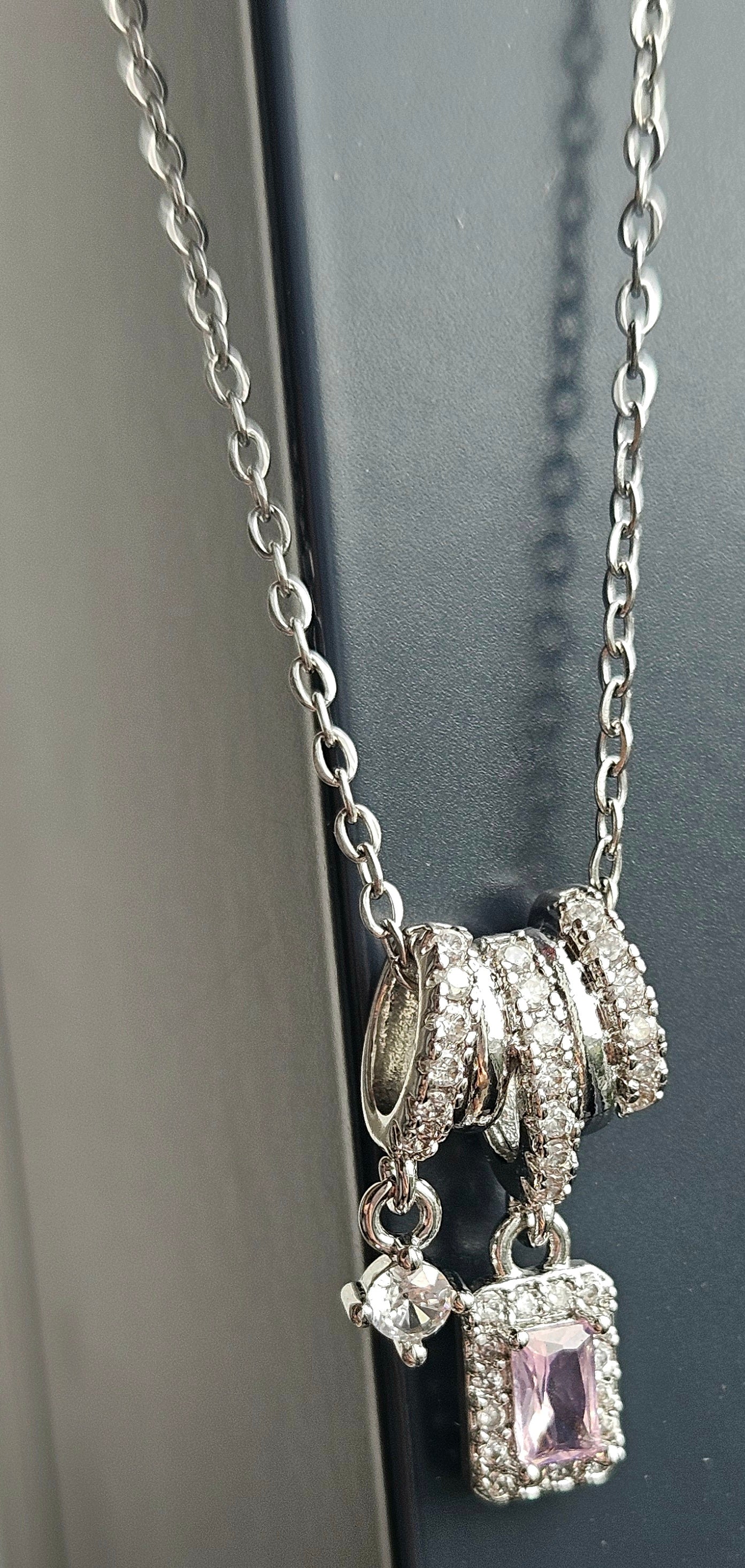 STAINLESS STEEL NECKLACE WITH PINK CUBIC ZIRCONIA PENDANT