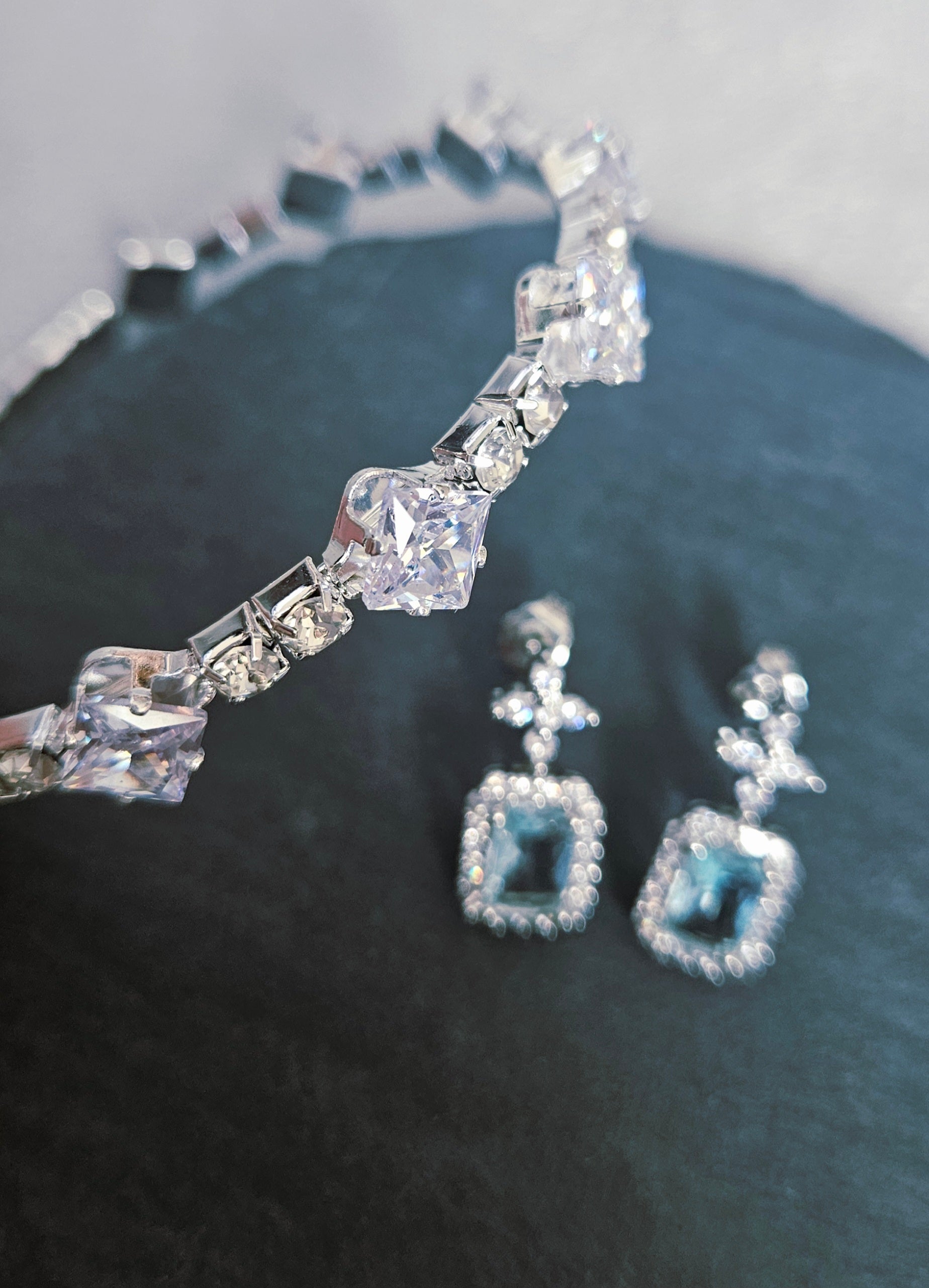 AQUA CUBIC ZIRCONIA EARRINGS AND RHINESTONE BRACELET SET