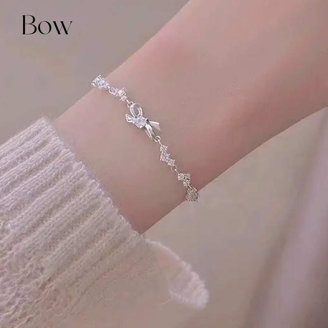 925 STERLING SILVER BOW BRACELET CRUSTED WITH CUBIC ZIRCONIA STONES