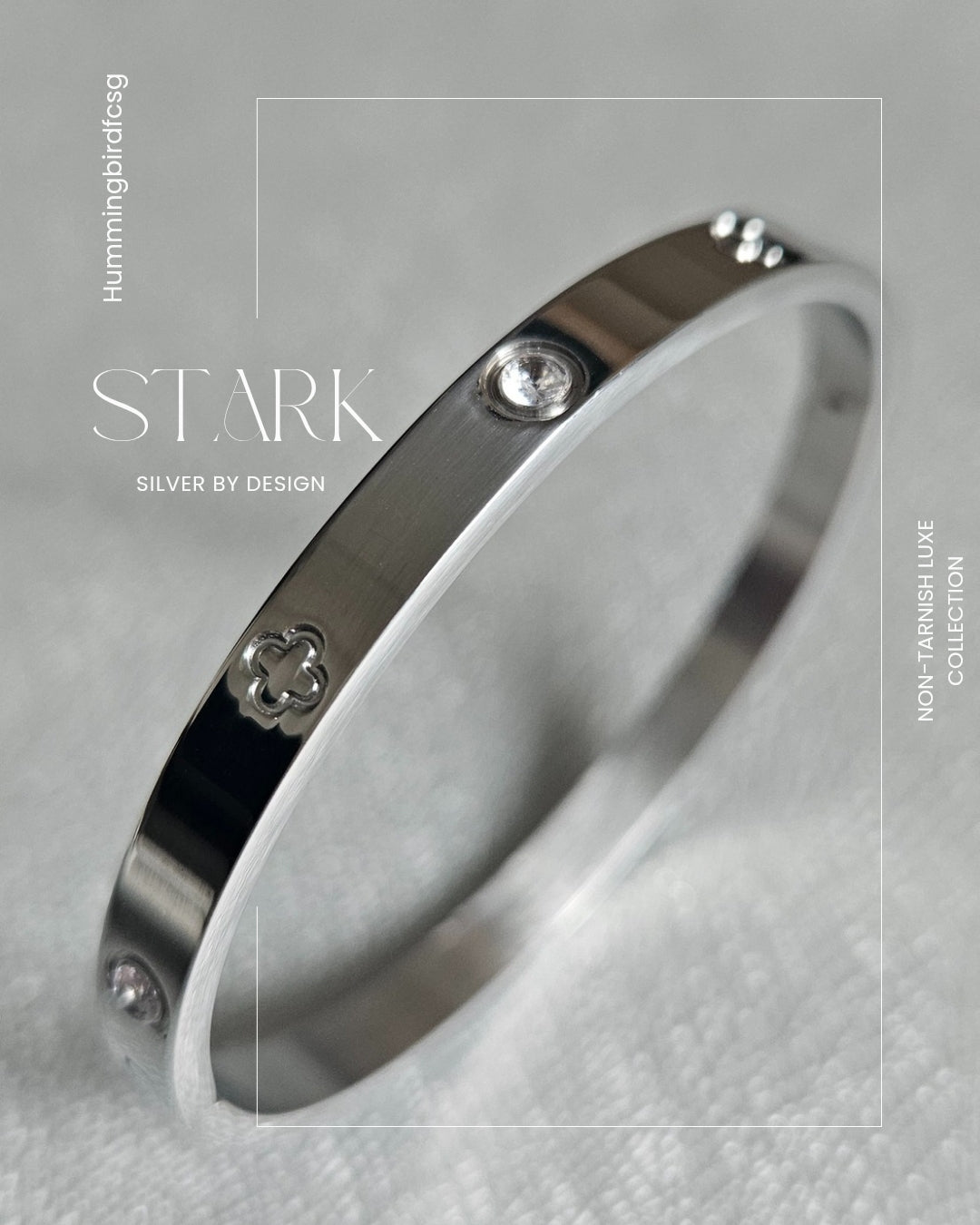 STAINLESS STEEL SILVER CLOVER BANGLE WITH RHINESTONES