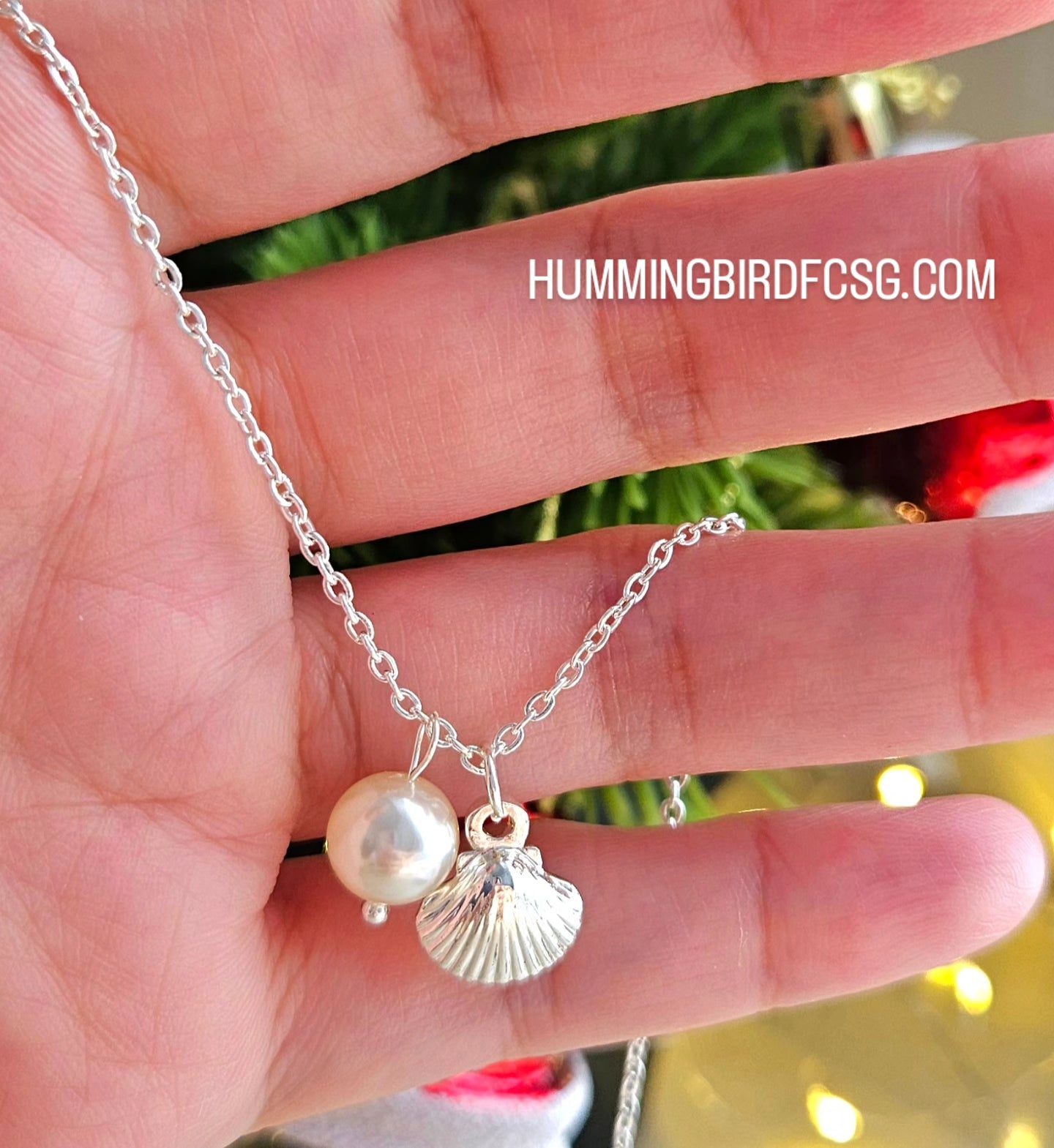 STAINLESS STEEL SILVER NECKLACE WITH FAUX PEARL AND SHELL PENDANT