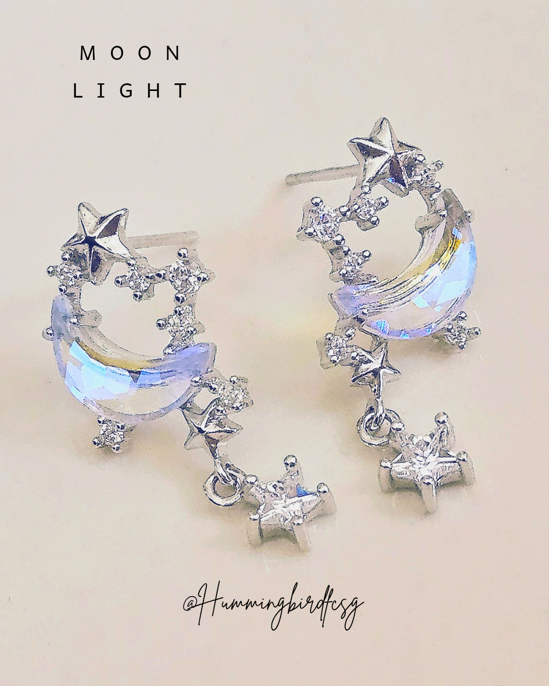 PLATINUM STARS EARRINGS WITH COLOUR-CHANGING CUBIC ZIRCONIA MOON
