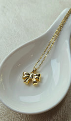 STAINLESS STEEL 18K GOLD-PLATED BOW NECKLACE & EARRINGS SET
