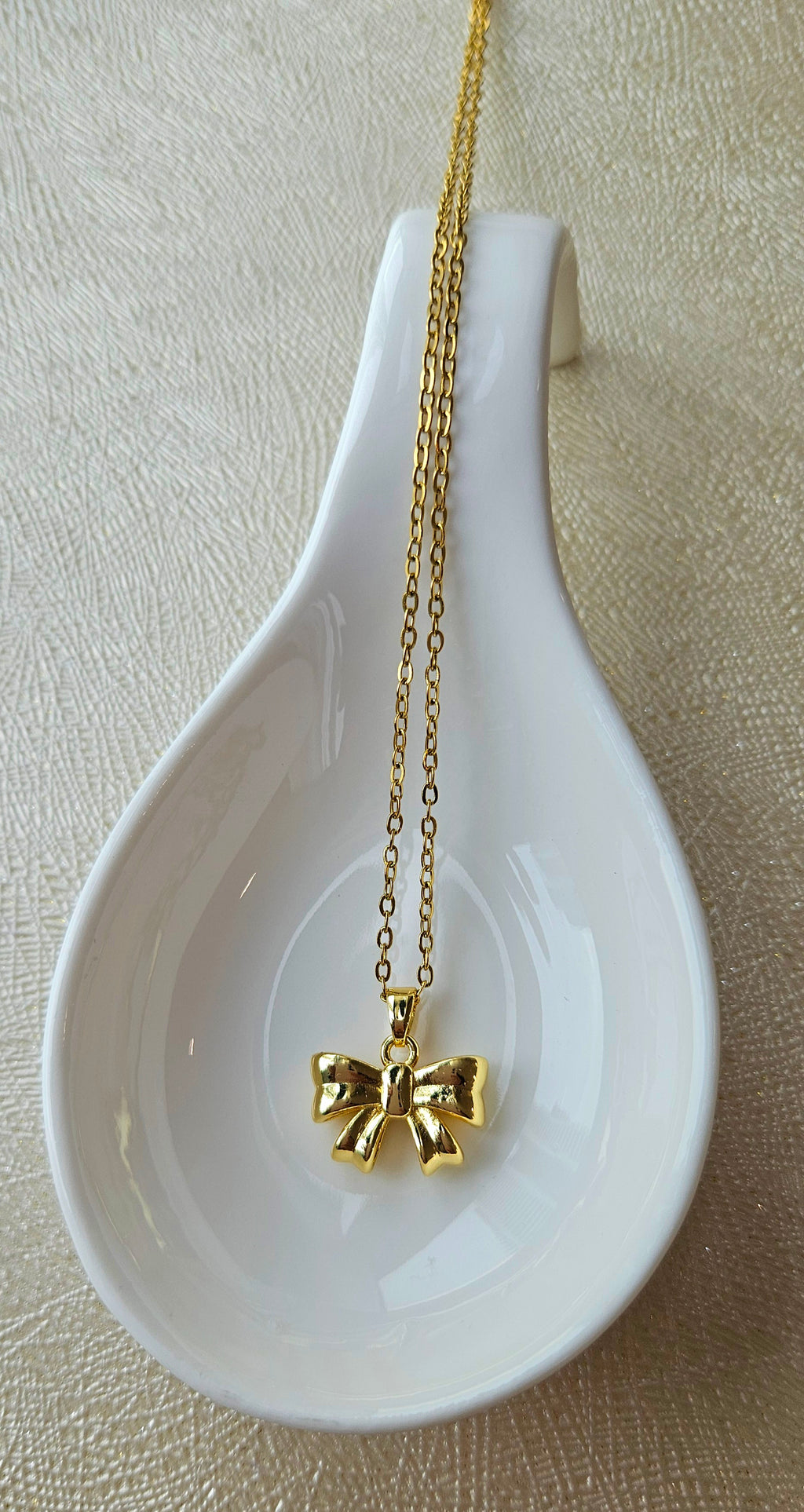 STAINLESS STEEL 18K GOLD-PLATED BOW NECKLACE & EARRINGS SET