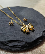 STAINLESS STEEL 18K GOLD-PLATED BOW NECKLACE & EARRINGS SET
