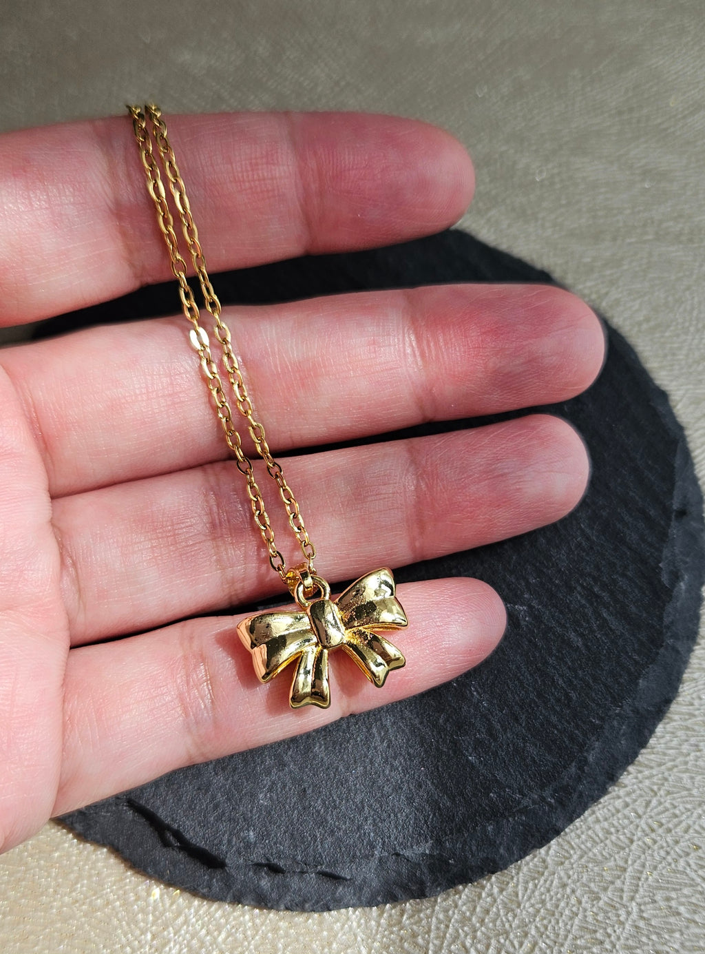 STAINLESS STEEL 18K GOLD-PLATED BOW NECKLACE & EARRINGS SET