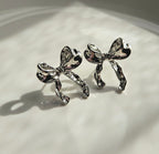 STAINLESS STEEL SILVER BOW EARRINGS AND NECKLACE SET