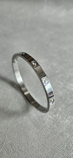 STAINLESS STEEL SILVER CLOVER BANGLE WITH RHINESTONES