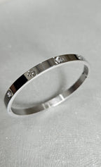STAINLESS STEEL SILVER CLOVER BANGLE WITH RHINESTONES