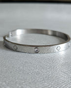 STAINLESS STEEL SILVER CLOVER BANGLE WITH RHINESTONES