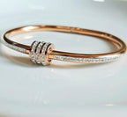 STAINLESS STEEL ROSE GOLD BANGLE WITH RHINESTONES