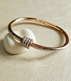 STAINLESS STEEL ROSE GOLD BANGLE WITH RHINESTONES