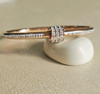 STAINLESS STEEL ROSE GOLD BANGLE WITH RHINESTONES