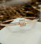 STAINLESS STEEL ROSE GOLD BANGLE WITH RHINESTONES