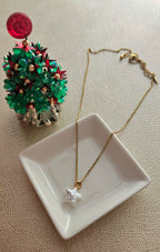 STAINLESS STEEL GOLD NECKLACE WITH A STAR PENDANT