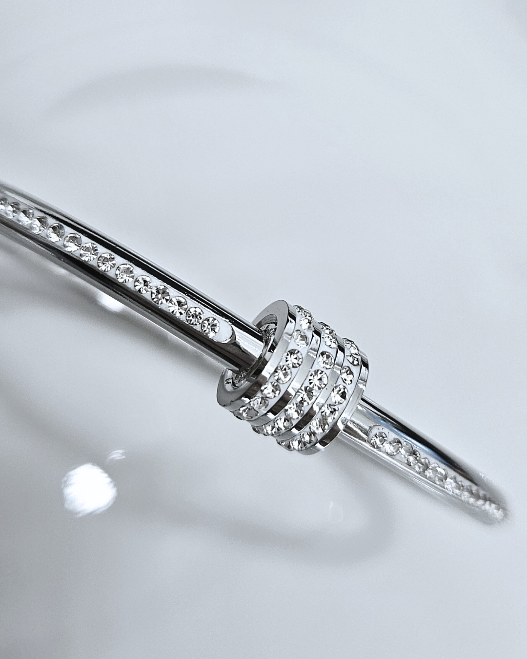 STAINLESS STEEL SILVER BANGLE WITH RHINESTONES