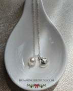 STAINLESS STEEL SILVER NECKLACE WITH FAUX PEARL AND SHELL PENDANT