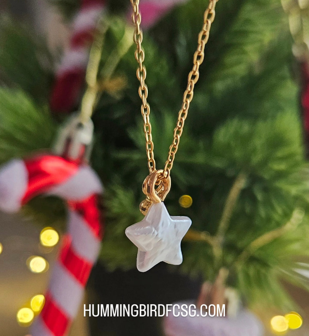 STAINLESS STEEL GOLD NECKLACE WITH A STAR PENDANT